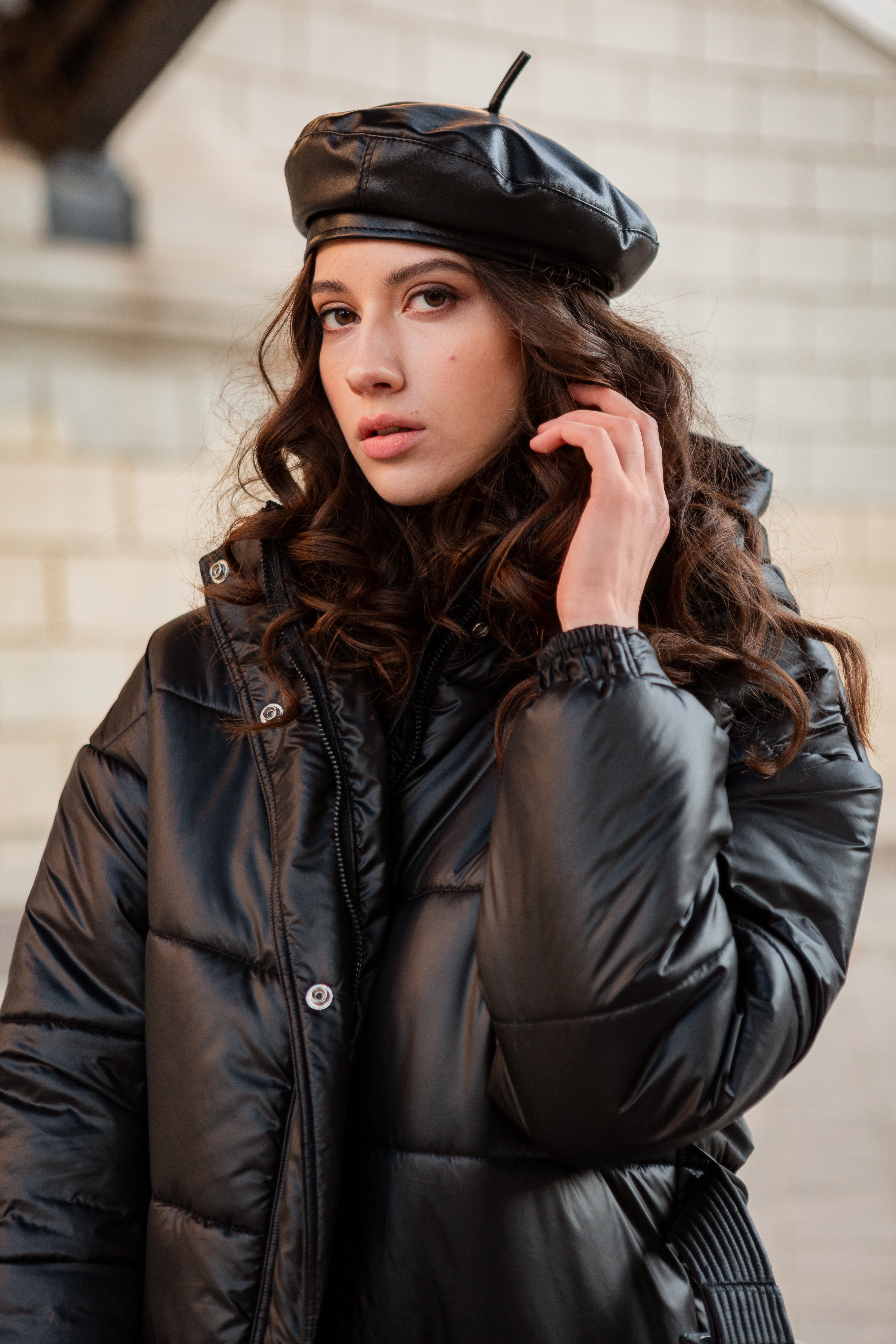 stylish-woman-posing-winter-autumn-fashion-trend-black-puffer-coat-leather-hat-beret-old-beautiful-street-wearing-high-heel-shoes.jpg